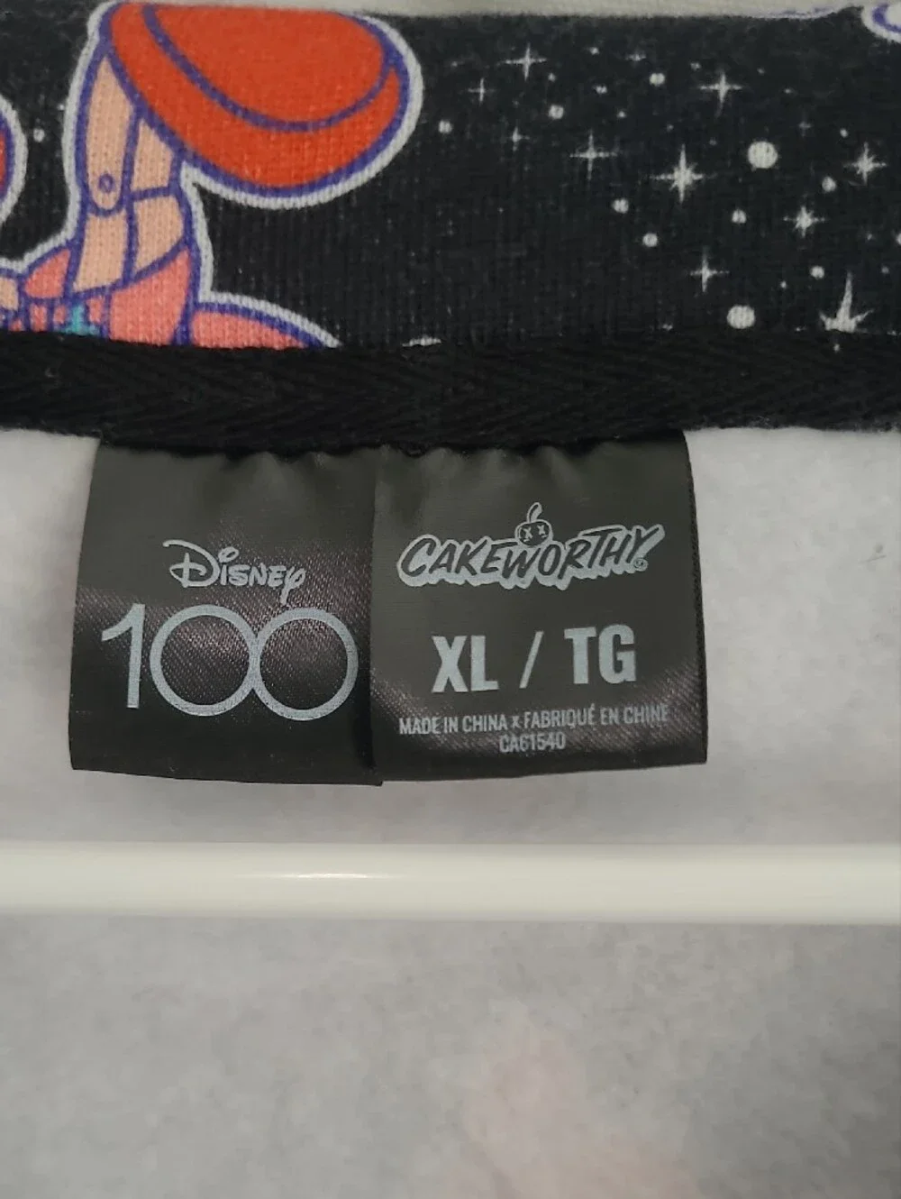 Disney 100 Women's ¼ Zip Pullover Sweater in Black with Alice, Peter Pan, & More